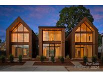 Three modern townhouses with large windows at 237 Marsh Rd # 101, Charlotte, NC 28209