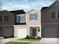 Modern two-story townhome with attached garage at 1253 Falling Acorn Ln, Concord, NC 28027