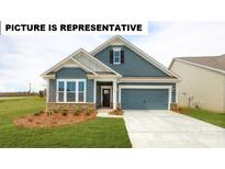 Curb appeal abounds in this charming craftsman style home! at 125 Sari St, Troutman, NC 28166