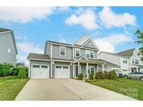 Two-story house with double garage at 1571 Whitman Ct, York, SC 29745