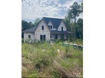 New construction home with a modern farmhouse design at 4293 Brandy Creek Ct # 91, Clover, SC 29710