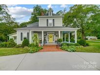 Charming two-story house with front porch at 101 S Maple St, Dallas, NC 28034