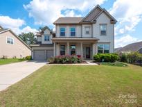 Two story home with front porch and landscaping at 775 Kathy Dianne Dr, Fort Mill, SC 29707