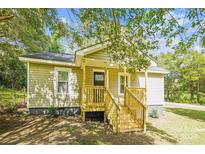 Charming house exterior with new porch and steps at 804 Sowell St, Lancaster, SC 29720