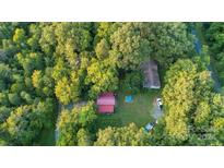 Aerial view of property showing two buildings and a pool at 9226 Maggie Robinson Rd # 143, Waxhaw, NC 28173