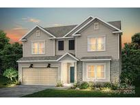 Two-story house with beige vinyl siding, a three-car garage, and a landscaped front yard at 5141 Hales Ford Rd # 18, Charlotte, NC 28215