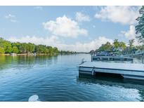 Scenic lakefront property with serene water views and private docks at 165 Woodstream Cir, Mooresville, NC 28117