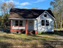 Newly renovated one-story home featuring a front porch and updated siding at 334 Whitner St, Rock Hill, SC 29730