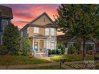 Charming two-story craftsman home with a welcoming front porch at 15862 Kiser Corner Ln, Davidson, NC 28036