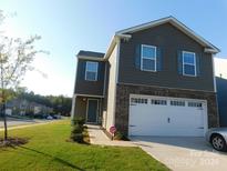 Two-story home with brick and siding at 2137 Redstone Dr, York, SC 29745