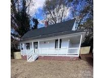 Newly renovated home with front porch and a spacious yard at 1112 2Nd St, Lancaster, SC 29720