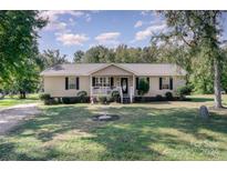 Ranch home with a yard and covered porch at 1123 Golden Maple Ln, Chester, SC 29706