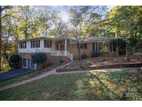Two-story house with attached garage and brick exterior at 681 Pine Bluff Cir, Kannapolis, NC 28081