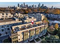 Townhouse community with rooftop decks; close to city skyline at 231 Uptown West Dr, Charlotte, NC 28208