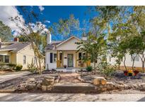 Charming house with a landscaped yard and front porch at 736 Cedar St, Rock Hill, SC 29730