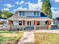 Beautiful light blue two-story home with a front porch at 709 Bringle Ferry Rd, Salisbury, NC 28144