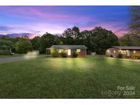 Brick ranch house with a spacious yard at 2117 Charlotte Hwy, Mooresville, NC 28117