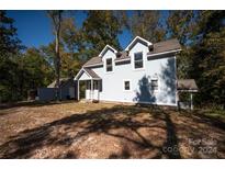 Two-story home with rustic exterior and landscaping at 1111 & 1075 Turkey Creek Ridge Rd, York, SC 29745