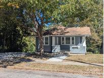 Charming gray house with a spacious front porch at 602 W Council St, Salisbury, NC 28144