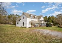 Two story farmhouse with large yard at 127 E Branch Ave, Shelby, NC 28152