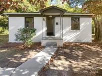 Charming brick ranch home with a well-maintained yard at 2614 Bancroft St, Charlotte, NC 28206