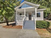 Gray house with a blue porch and steps at 728 Jefferson Ave, Rock Hill, SC 29730