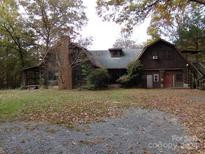 Rustic log cabin home with large yard at 627 Bolick Rd, Fort Mill, SC 29707