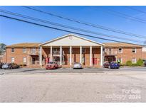 Brick building with columns and parking at 2123 Carriage Woods Ln, Kannapolis, NC 28081