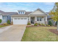 Charming craftsman style house with front porch and two car garage at 1501 Liberty Row Dr, Fort Mill, SC 29708