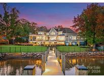 Luxury home on lake with dock and beautiful sunset views at 16500 Green Dolphin Ln, Cornelius, NC 28031