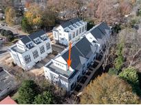 Aerial view of townhouses with private rooftop decks at 1425 Collier Walk Aly # Csw0211, Charlotte, NC 28205