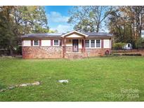 Brick ranch home with solar panels and spacious yard at 1572 W Lakewood Dr # 19, Rock Hill, SC 29732