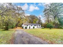 Newly renovated ranch home with a deck at 3865 Highway 200 Hwy, Concord, NC 28025