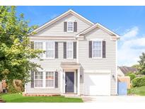 Two-story house with gray siding, a two-car garage, and a well-maintained lawn at 612 Carybrook Ct, York, SC 29745