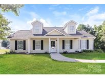 Charming one-story home with a landscaped lawn at 714 Knots Lndg, Clover, SC 29710