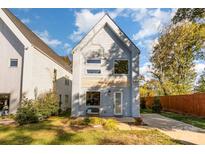 Modern two-story house with light gray siding at 4147 Merlane Dr, Charlotte, NC 28206
