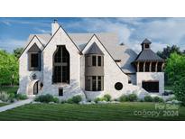 Elegant two-story home with stone exterior at 8015 Litaker Manor Ct, Charlotte, NC 28270