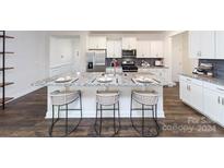 Modern kitchen with an island and stainless steel appliances at 4356 Bronze Blvd, Sherrills Ford, NC 28673