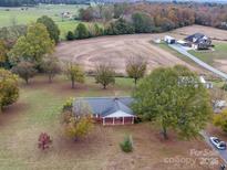 Ranch house on large lot with detached garage and shed at 3113 Old Pageland Marshville Rd, Wingate, NC 28174