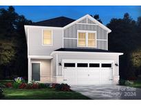 Two-story house with gray siding, white trim, and a two-car garage at 913 Smithcliffs Trl, York, SC 29745
