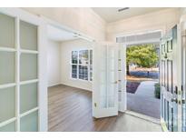 Bright entryway with view of backyard and office at 8502 Darcy Hopkins Dr, Charlotte, NC 28277