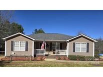 Charming ranch home with front porch and landscaping at 1627 Peden Bridge Rd, Chester, SC 29706