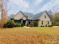 Two-story house with stone and siding exterior at 2818 Rockford Rd, Shelby, NC 28152