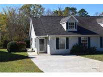 Charming one-story home with a gray roof and landscaping at 1091 Farm Pond Ln, Rock Hill, SC 29732