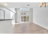 Spacious living room with high ceilings and hardwood floors at 3655 Warp St, Charlotte, NC 28205