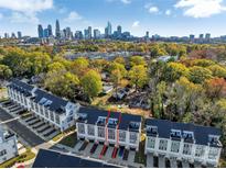 Townhouses with city skyline view in the background at 582 West End Dr, Charlotte, NC 28208