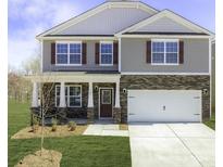 Two-story home with stone accents, a large front porch, and a two-car garage at 3892 Maxwell Henry Nw Ln, Conover, NC 28613