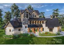 Two-story craftsman style home with stone accents and a metal roof at 0 S Potter Rd # 2B, Waxhaw, NC 28173