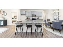 Modern kitchen with granite countertops and stainless steel appliances at 4225 Steel Way, Sherrills Ford, NC 28673