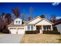 Beautiful two-story house with a two-car garage and well-manicured lawn at 2018 Clarion Dr, Indian Land, SC 29707